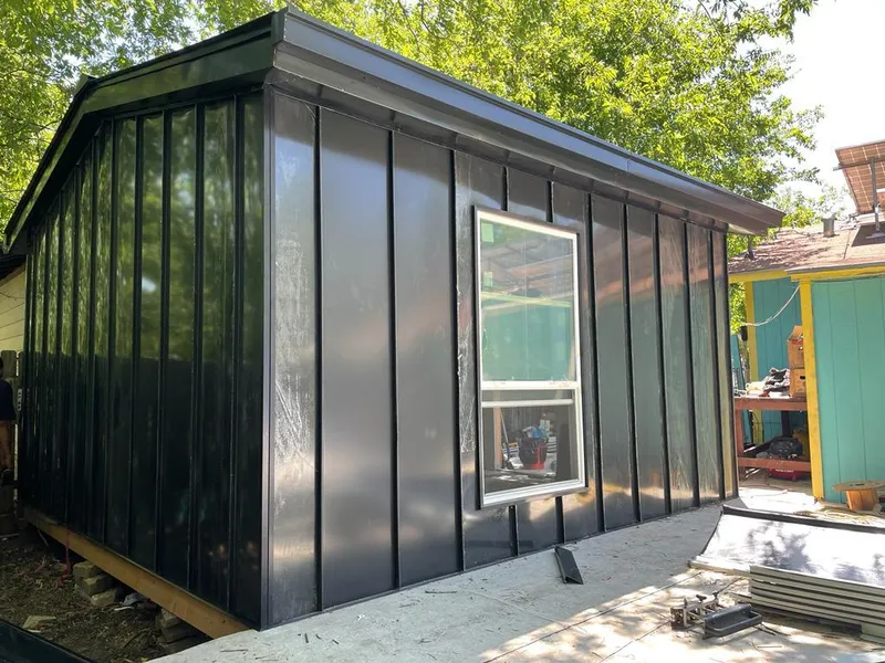 Black standing seam metal wall panels for Metal Roof Installation in Hadley