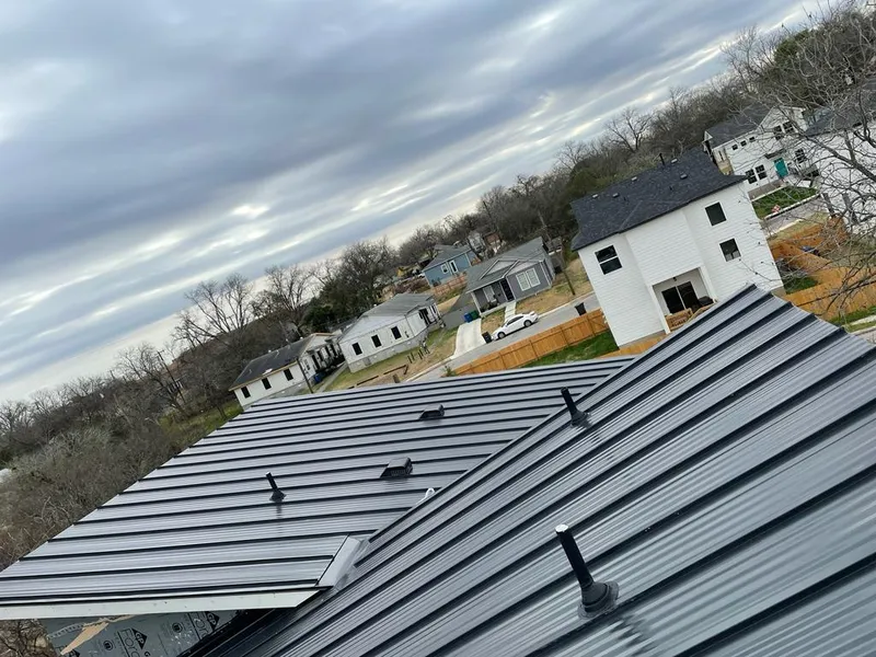 Standing seam metal roof panels with vents for Skylight Repair in Hadley